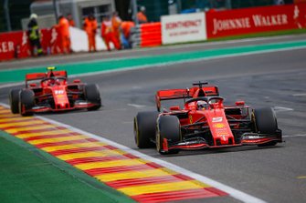Sebastian Vettel, Ferrari SF90, leads Charles Leclerc, Ferrari SF90