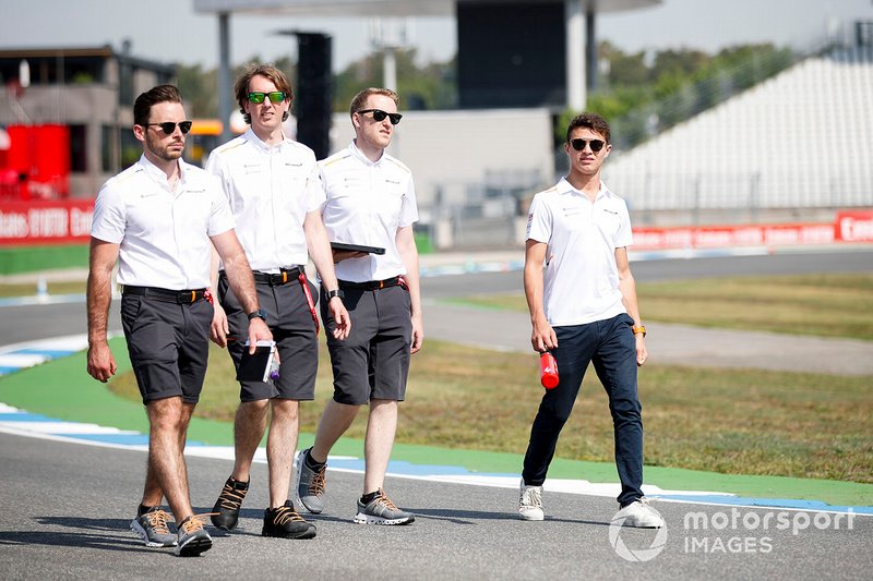 Lando Norris, McLaren walks the track with his mechanics