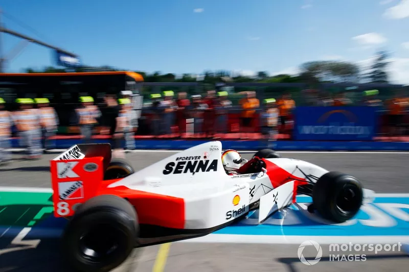 Sebastian Vettel drives Ayrton Senna's McLaren MP4/8