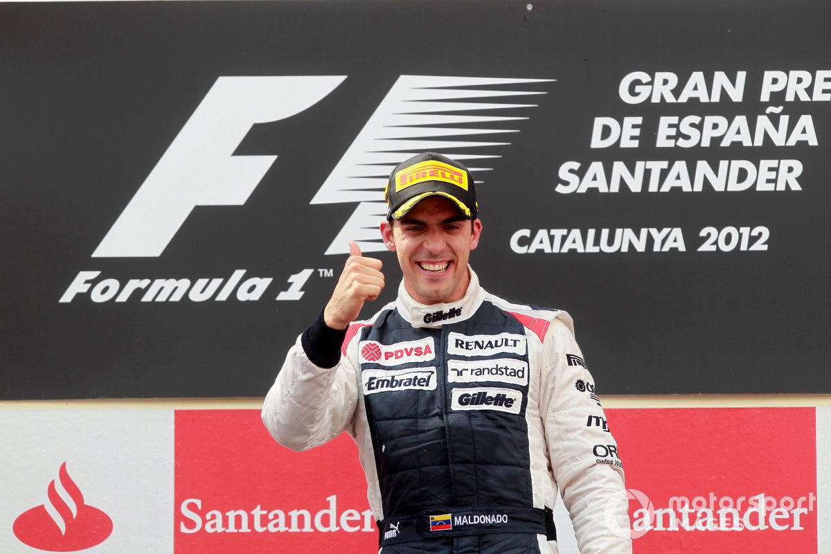 Race winner Pastor Maldonado, Williams F1 Team, celebrates on the podium