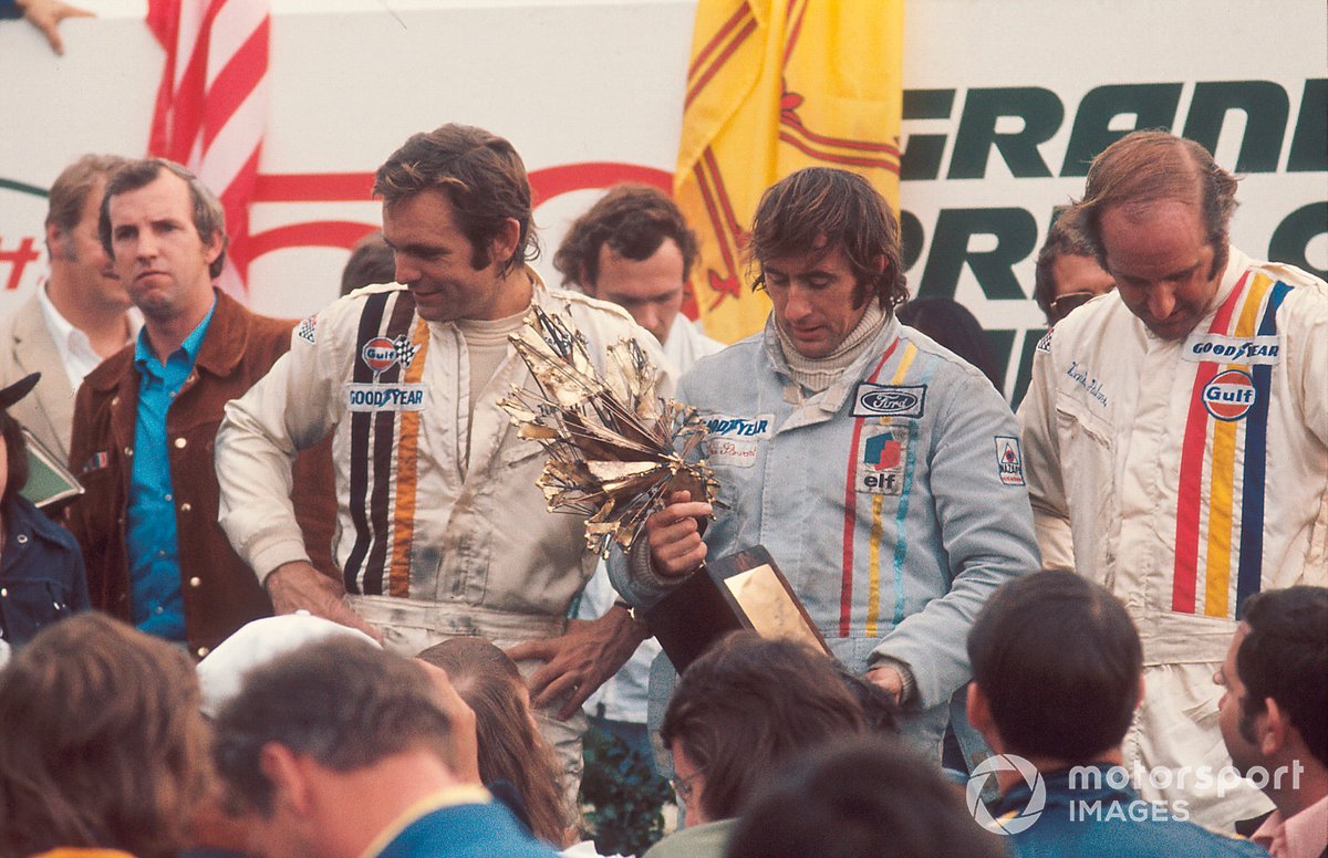 Podium: Race winner Jackie Stewart, Tyrrell Ford,second place Peter Revson, McLaren Ford, third place Denny Hulme, McLaren Ford