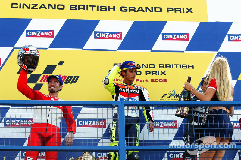 Podium: winner Valentino Rossi, Honda Team, second place Max Biaggi, Yamaha Team, third place Alex Barros, Honda Pons