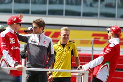 Sebastian Vettel, Ferrari, Romain Grosjean, Haas F1 Team, Kevin Magnussen, Renault Sport F1 Team et Kimi Raikkonen, Ferrari lors de la parade des pilotes