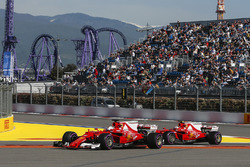 Kimi Raikkonen, Ferrari SF70H and Sebastian Vettel, Ferrari SF70H runs wide