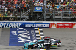 Denny Hamlin, Joe Gibbs Racing Toyota, William Byron, JR Motorsports Chevrolet, crosses the checkered flag