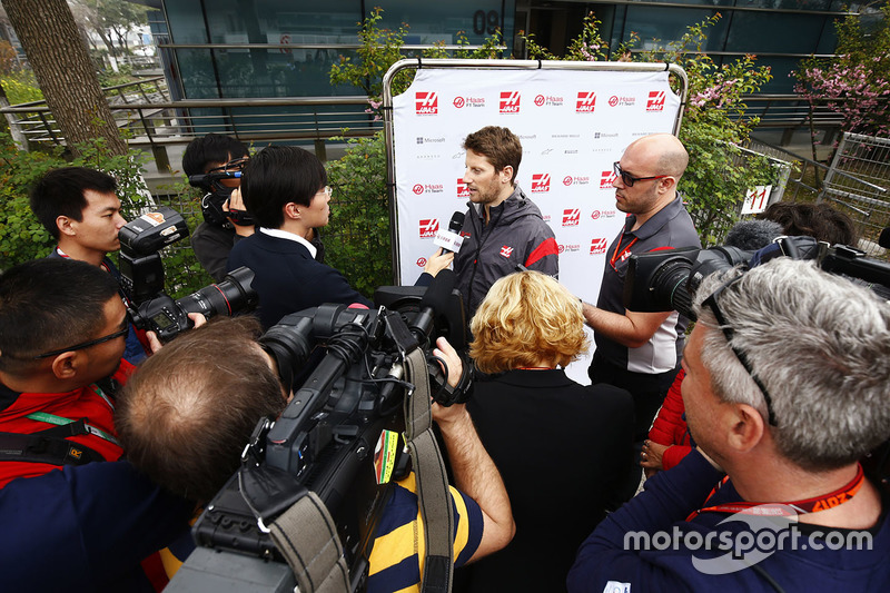 Romain Grosjean, Haas F1 Team, speaks to the media