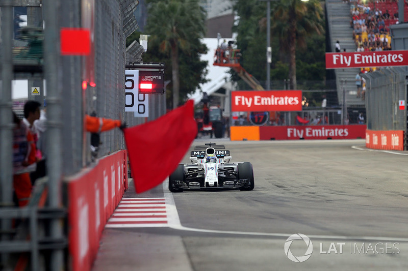 Felipe Massa, Williams FW40 and Marshal waves a red flag