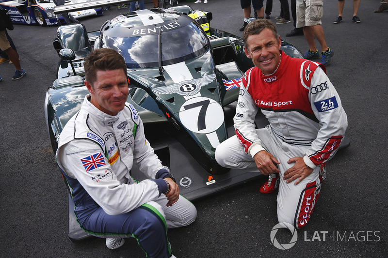 Guy Smith and Tom Kristensen pose, the Bentley Speed 8 LMP1 that they shared to victory at Le Mans i