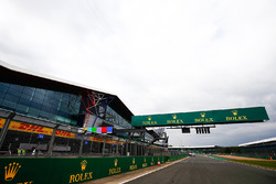 Rolex branding across the Silverstone pit straight, opposite the Silverstone Wing