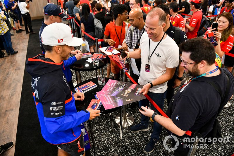 Pierre Gasly, Toro Rosso and Daniil Kvyat, Toro Rosso sign autographs for fans