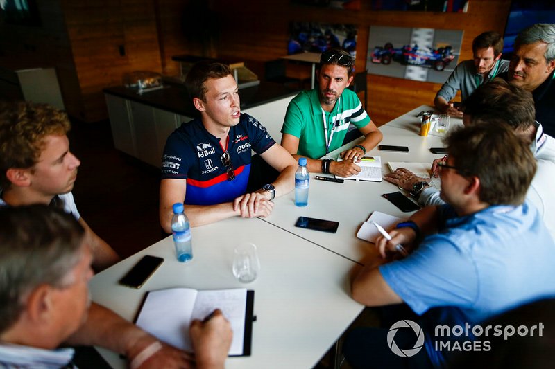 Daniil Kvyat, Toro Rosso, talks to media