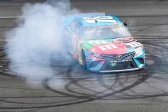 Kyle Busch, Joe Gibbs Racing, Toyota Camry M&M's Hazelnut, celebrates after winning the Pocono 400