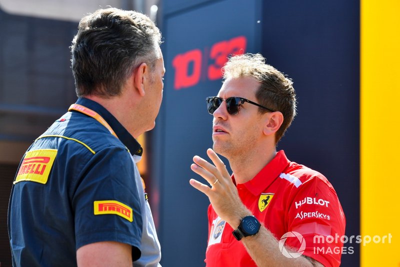 Sebastian Vettel, Ferrari y Mario Isola, Pirelli Motorsport
