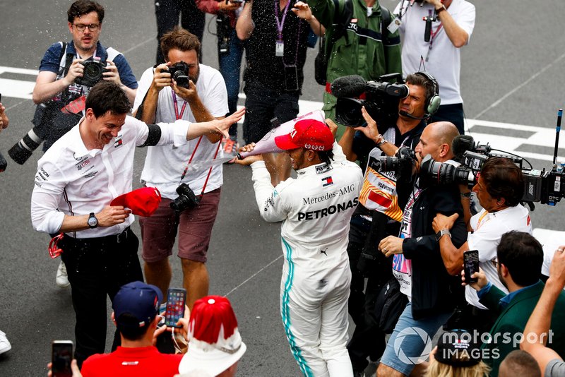 Lewis Hamilton, Mercedes AMG F1, 1st position, sprays Champagne at Toto Wolff, Executive Director (Business), Mercedes AMG