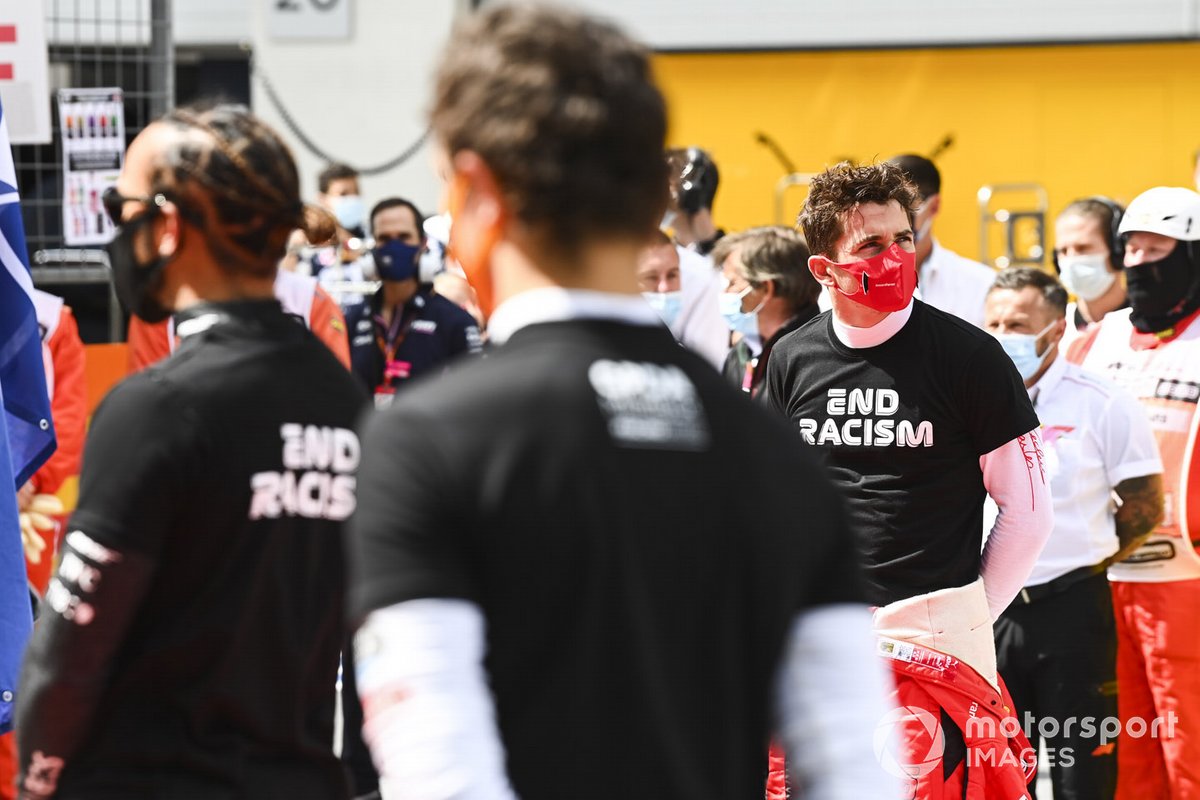 Lewis Hamilton, Mercedes-AMG Petronas F1, and Charles Leclerc, Ferrari, on the grid prior to the start
