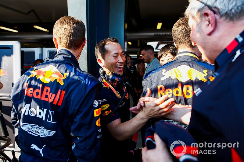 Red Bull team personnel celebrate a podium finish for Max Verstappen, Red Bull Racing