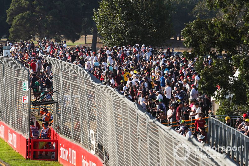 Fans watch from a packed grandstand
