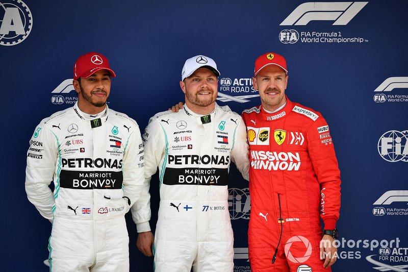 Top three Qualifiers Lewis Hamilton, Mercedes AMG F1, pole man Valtteri Bottas, Mercedes AMG F1, and Sebastian Vettel, Ferrari
