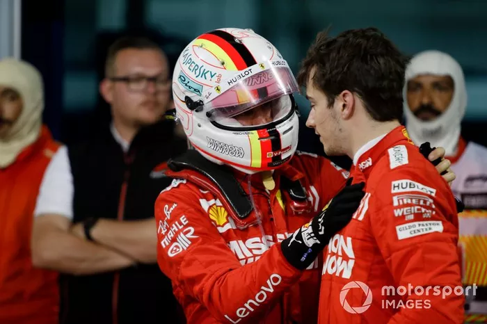 Sebastian Vettel, Ferrari, parla con il suo compagno di squadra Charles Leclerc, Ferrari, 3° classificato, dopo la gara