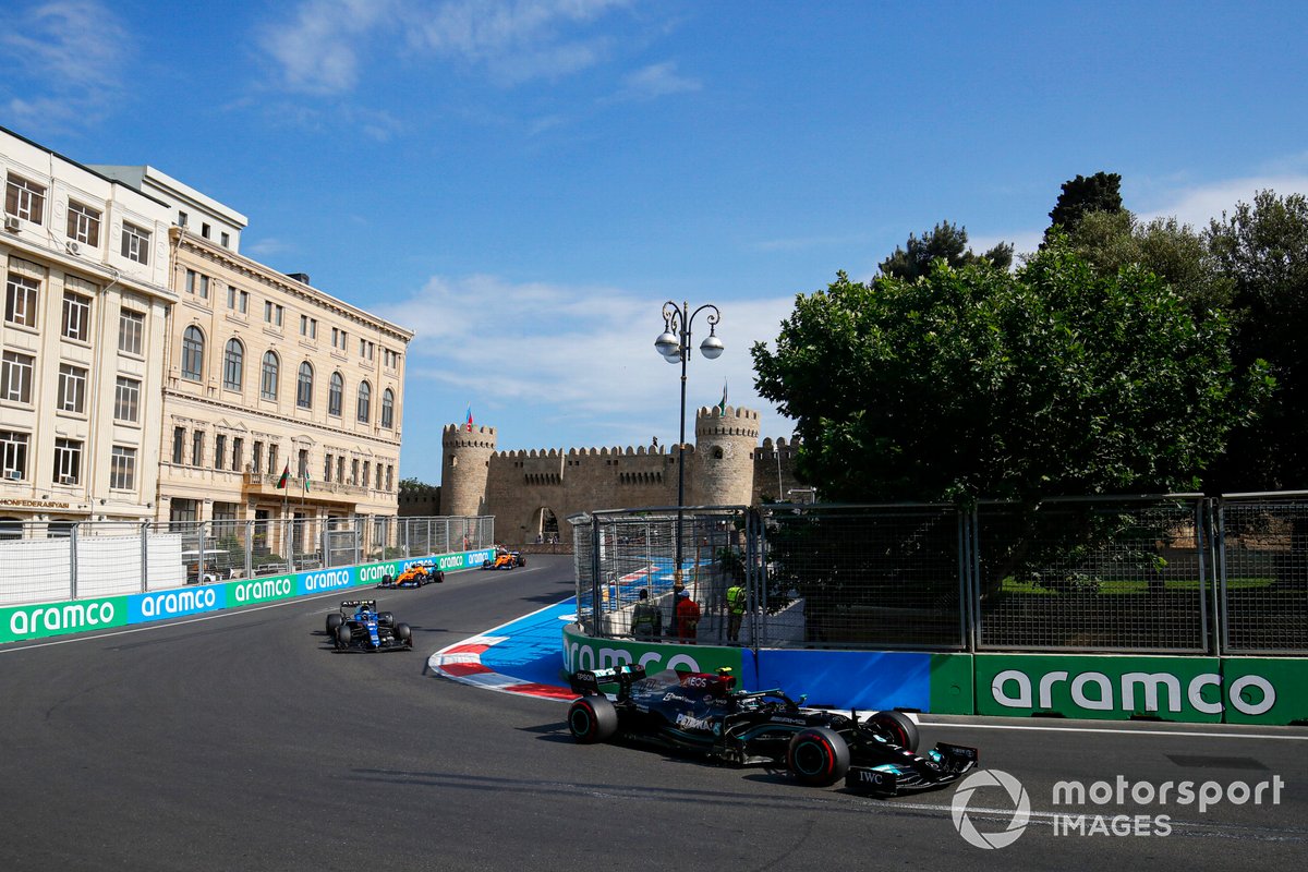 Valtteri Bottas, Mercedes W12, Esteban Ocon, Alpine A521, and Lando Norris, McLaren MCL35M