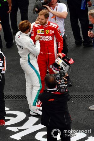 Lewis Hamilton, Mercedes AMG F1 and Sebastian Vettel, Ferrari celebrate in Parc Ferme 