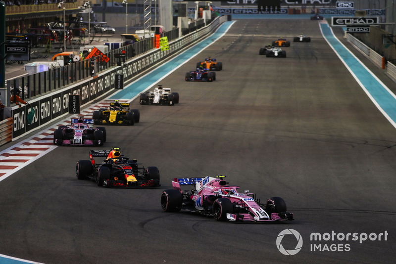 Esteban Ocon, Racing Point Force India VJM11, leads Max Verstappen, Red Bull Racing RB14, eEsteban Ocon, Racing Point Force India VJM11, Carlos Sainz Jr., Renault Sport F1 Team R.S. 18, and Marcus Ericsson, Sauber C37