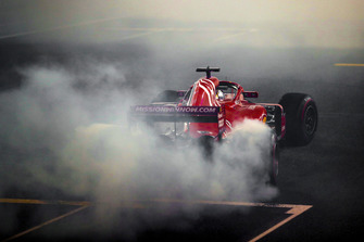 Sebastian Vettel, Ferrari SF71H, performs donuts after the race