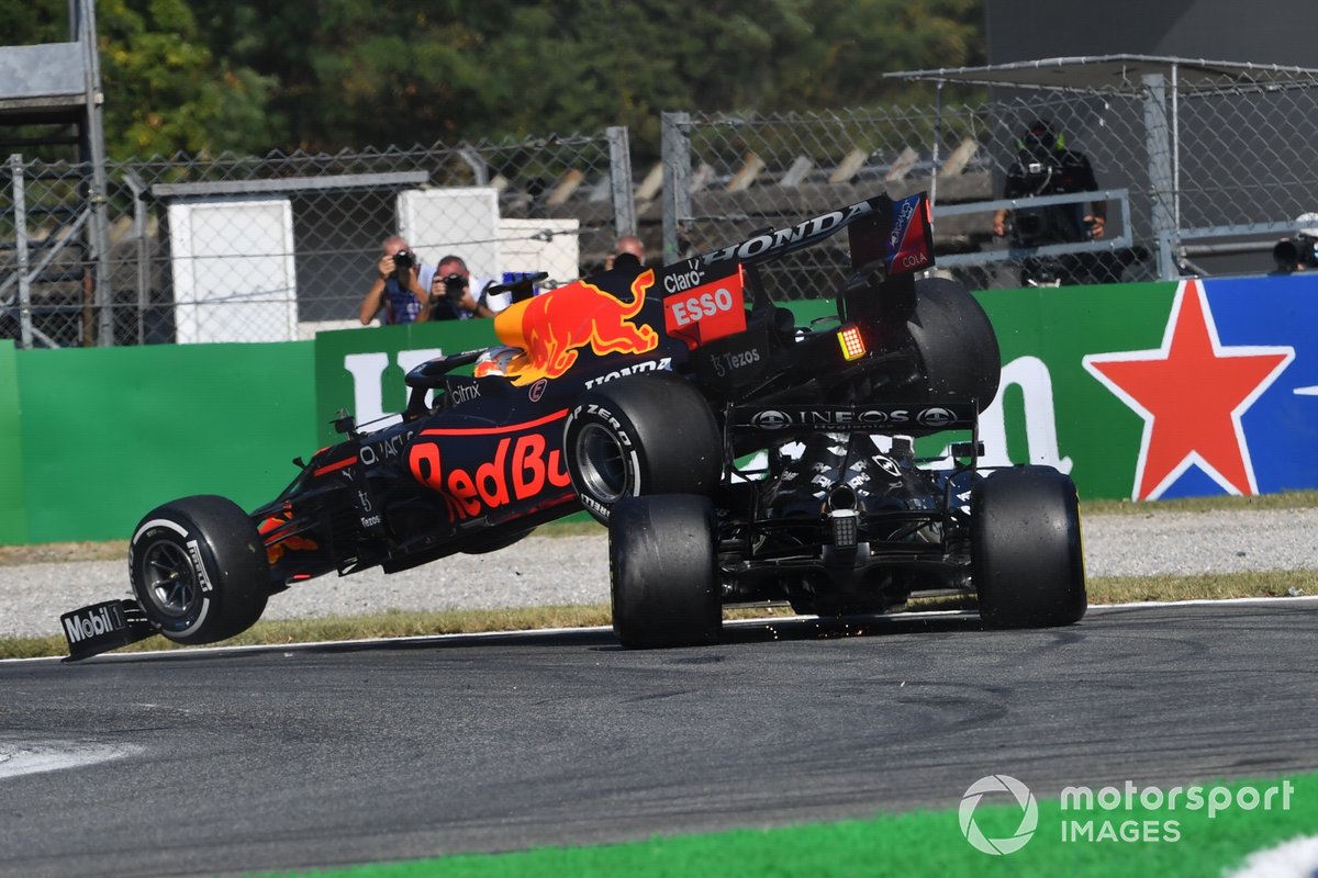 Max Verstappen, Red Bull Racing RB16B, and Lewis Hamilton, Mercedes W12, collide