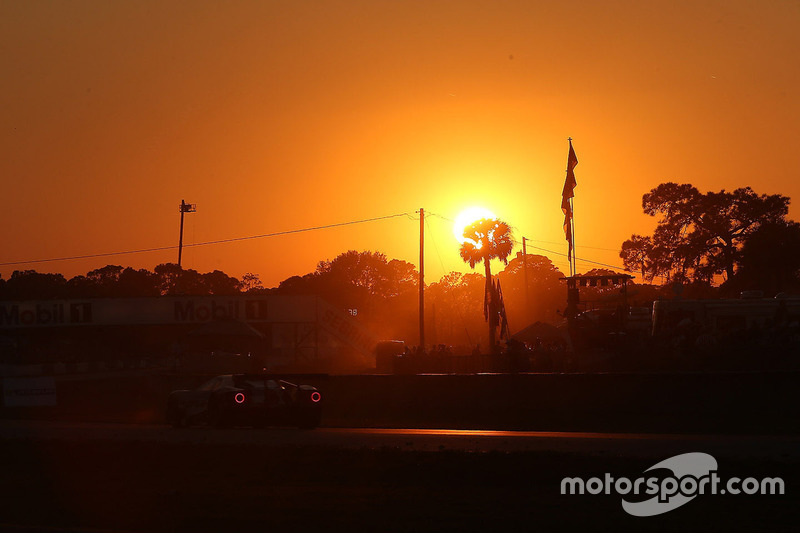 Track action at sunset