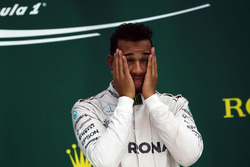 Race winner Lewis Hamilton, Mercedes AMG F1 celebrates on the podium