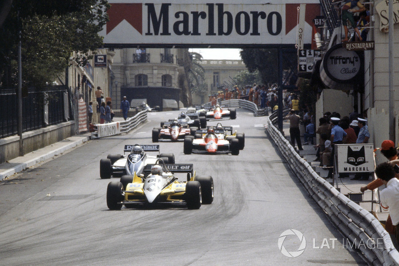 Rene Arnoux, Renault RE30B leads Riccardo Patrese, Brabham BT49D-Ford Cosworth, Bruno Giacomelli, Alfa Romeo 182, Alain Prost, Renault RE30B and Didier Pironi, Ferrari 126C2