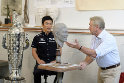 Takuma Sato sitting for Borg-Warner Trophy bust