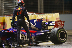 Daniil Kvyat, Scuderia Toro Rosso, climbs out of his car after crashing out