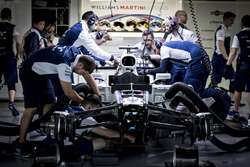 Williams engineers work on the car of Felipe Massa, Williams FW40