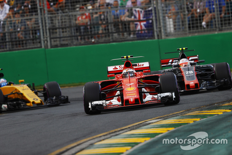 Kimi Raikkonen, Ferrari SF70H, leads Kevin Magnussen, Haas F1 Team VF-17 and Jolyon Palmer, Renault Sport F1 Team RS17