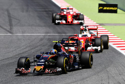 Carlos Sainz Jr., Scuderia Toro Rosso STR11 leads Sebastian Vettel, Ferrari SF16-H