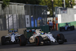 Felipe Massa, Williams FW38, leads Valtteri Bottas, Williams FW38
