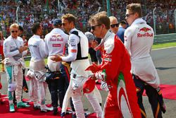 Kimi Raikkonen, Ferrari as the grid observes the national anthem