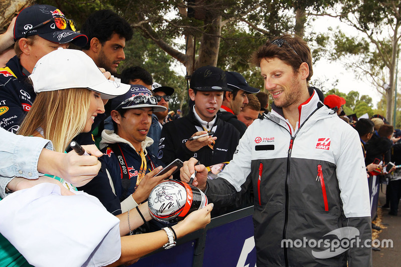 Romain Grosjean, Haas F1 Team signs autographs for the fans