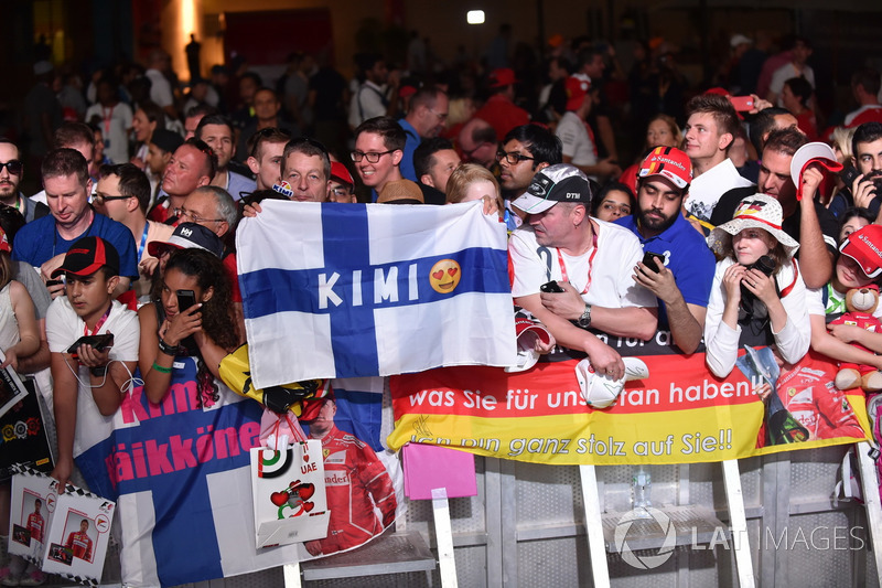 Kimi Raikkonen, Ferrari fans and banner