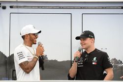 Lewis Hamilton, Mercedes-AMG F1 and Valtteri Bottas, Mercedes-AMG F1 on stage