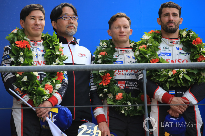 Overall podium: second place Mike Conway, Kamui Kobayashi, Jose Maria Lopez, Toyota Gazoo Racing