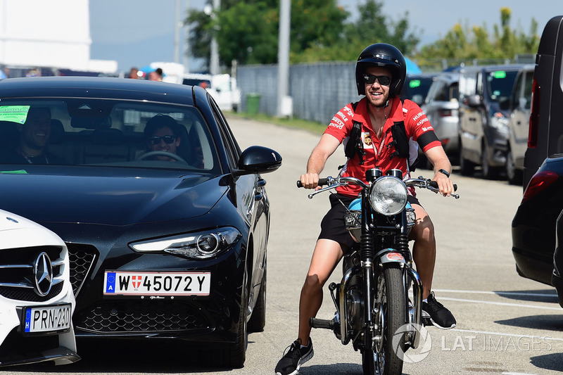 Sebastian Vettel, Ferrari on his Triumph motorbike
