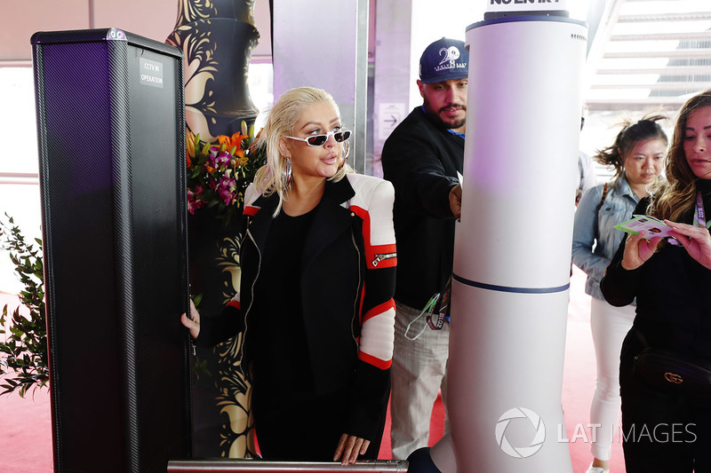 Christina Aguilera arrives in the paddock