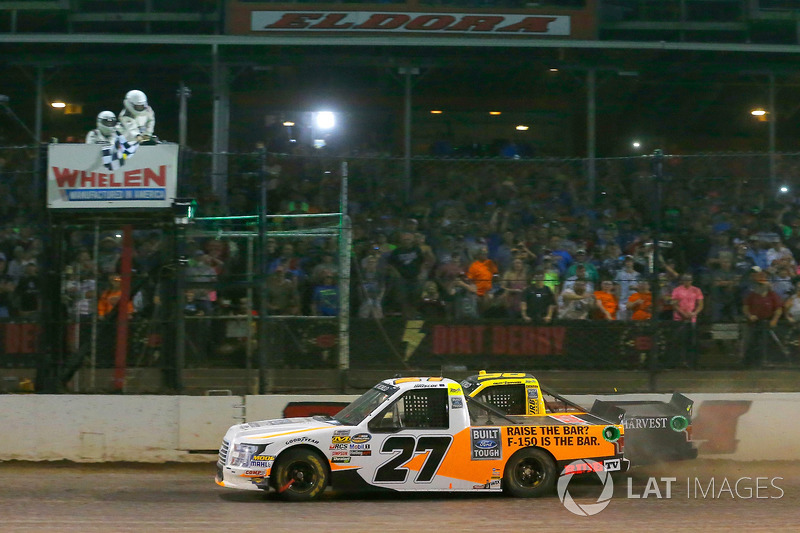 Chase Briscoe, ThorSport Racing, Ford F-150 Ford drives under the checkered flag to win