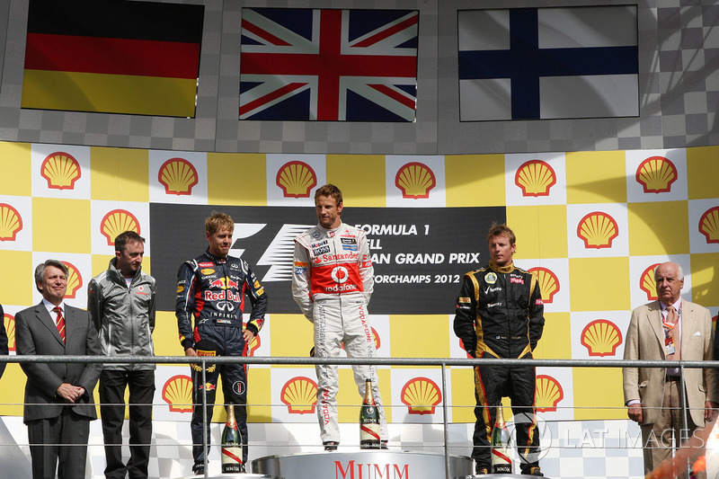 Podium: race winner Jenson Button, McLaren, second place Sebastian Vettel, Red Bull Racing, third place Kimi Raikkonen, Lotus F1