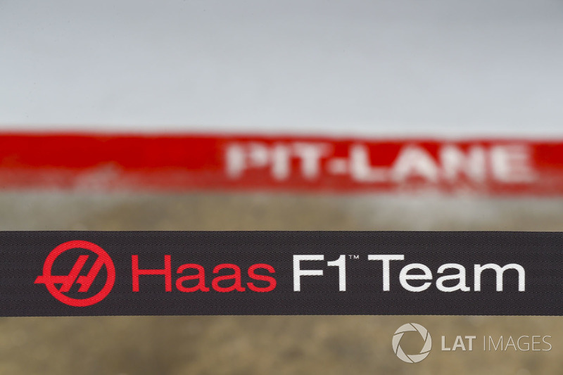 The Haas F1 Team's logo in their pit
