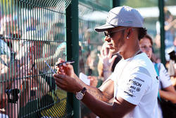 Lewis Hamilton, Mercedes AMG F1 signs autographs for the fans