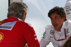 (L to R): Maurizio Arrivabene, Ferrari Team Principal with Toto Wolff, Mercedes AMG F1 Shareholder a