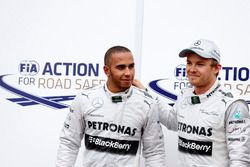 Lewis Hamilton and Nico Rosberg, Mercedes W04, celebrate securing first and second positions